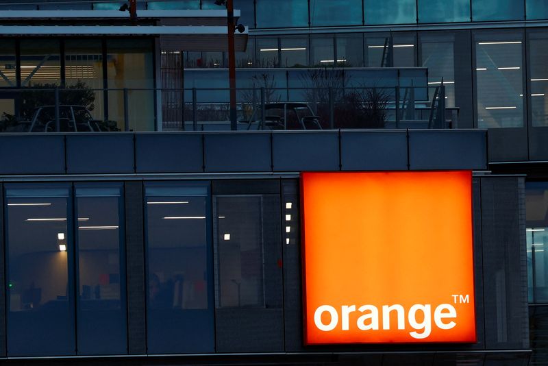 &copy; Reuters. FILE PHOTO: Logo of French telecom operator Orange hangs at the company headquarters in Issy-les-Moulineaux near Paris, France, February 9, 2024. REUTERS/Gonzalo Fuentes/File photo