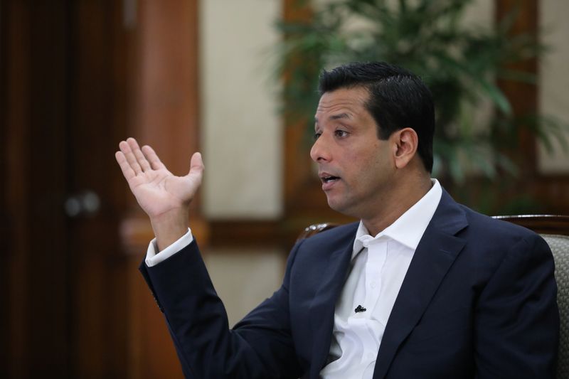 &copy; Reuters. Sajeeb Wazed, son of the Prime Minister Sheikh Hasina and the Information and Communication Advisor of Bangladesh government, gestures during an interview with Reuters at the Prime Minister's residence in Dhaka, Bangladesh, December 29, 2018. REUTERS/Moha