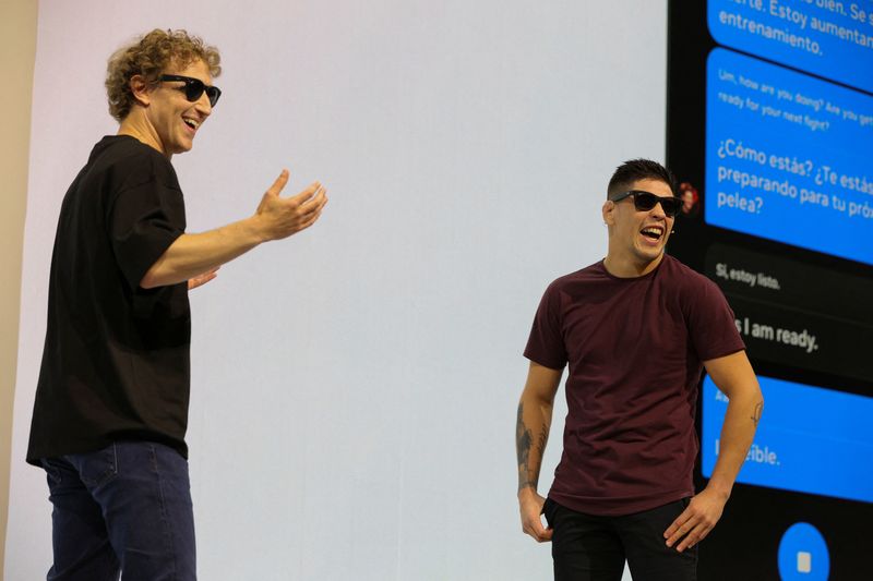 © Reuters. Meta CEO Mark Zuckerberg presents the Ray-Ban Meta smart glasses together with mixed martial artist Brandon Moreno, as he makes a keynote speech during the Meta Connect annual event, at the company's headquarters in Menlo Park, California, U.S. September 25, 2024. REUTERS/Manuel Orbegozo