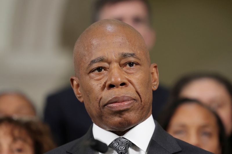 © Reuters. FILE PHOTO: New York City Mayor Eric Adams listens to a reporter during an event in Manhattan in New York City, U.S., September 16, 2024. REUTERS/Kent J Edwards/File Photo