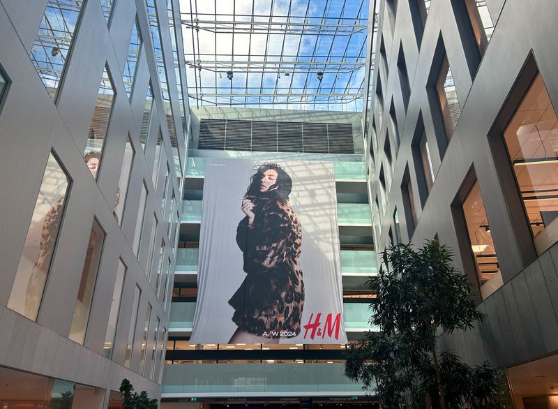 &copy; Reuters. Promotional advertisement of H&M's autumn/winter collection featuring pop star Charli XCX is seen inside the fashion retailer's headquarters in Stockholm, Sweden, September 26, 2024. REUTERS/Marie Mannes