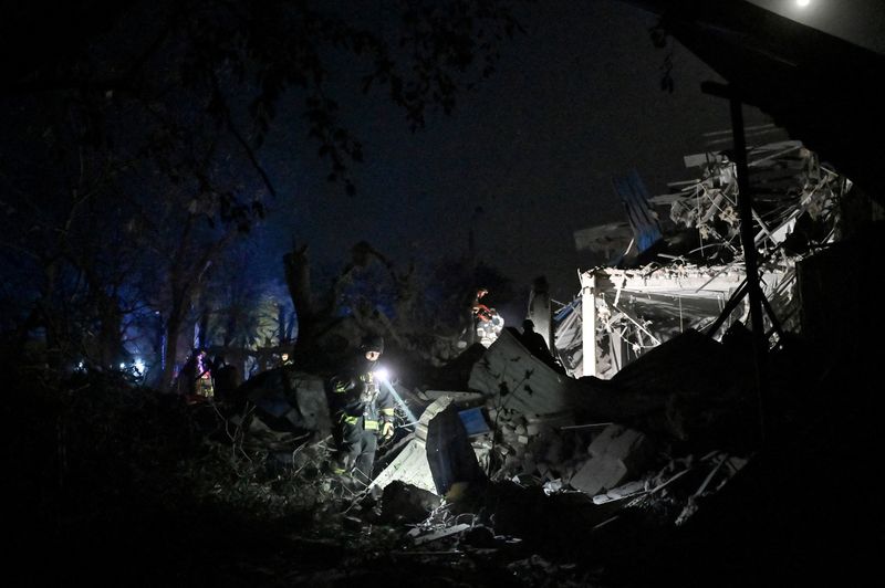 &copy; Reuters. FILE PHOTO: Ukrainian emergency services conduct a search and rescue operation among the rubble  at the site where a hotel was hit by a missile in Kramatorsk, Donetsk region, after local authorities said Russia launched several attacks in the Ukrainian re