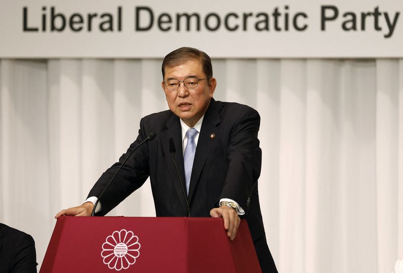 © Reuters. Former Defense Minister Shigeru Ishiba, a candidate of Japan's ruling Liberal Democratic Party (LDP) presidential election, speaks during a joint press conference at the LDP headquarters in Tokyo, Japan, September 13, 2024. FRANCK ROBICHON/Pool via REUTER