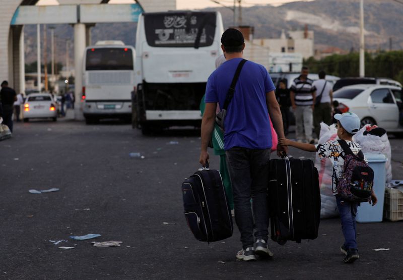 &copy; Reuters. Sírios deixam o Líbano de volta para Sirian 25/9/2024   REUTERS/Yamam al Shaar