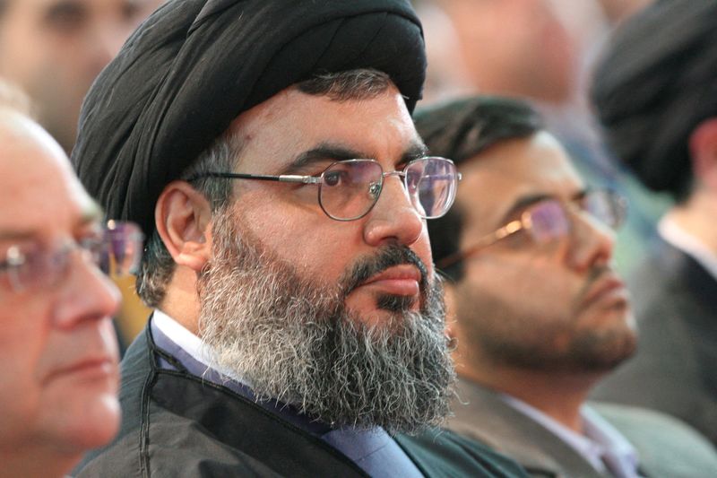 &copy; Reuters. FILE PHOTO: Hezbollah leader Sayyed Hassan Nasrallah (C) attends a graduation ceremony at a university run by the group in a Beirut suburb April 8, 2007.REUTERS/ Jamal Saidi/File Photo