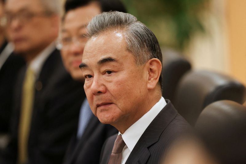 © Reuters. FILE PHOTO: China's Foreign Minister Wang Yi looks on as he meets with U.S. Secretary of State Antony J. Blinken in New York, U.S. September 27, 2024. Heather Khalifa/Pool via REUTERS/File Photo