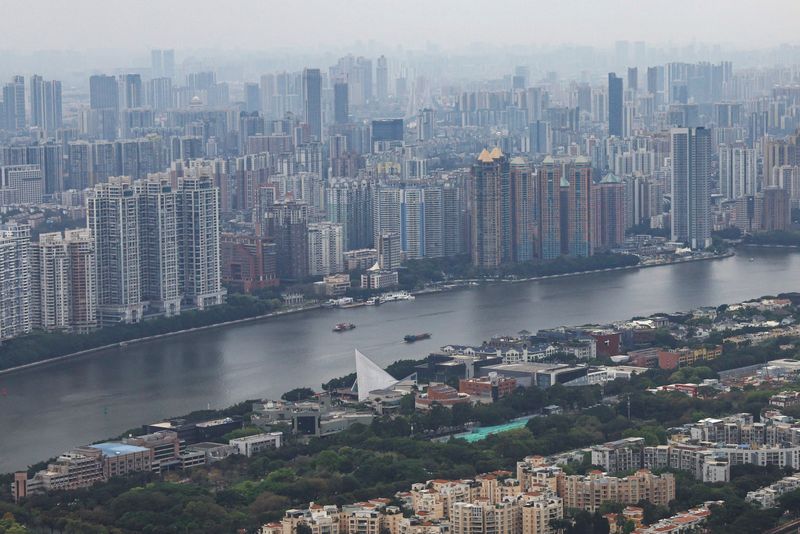 China property shares jump as major cities ease buying curbs By Reuters