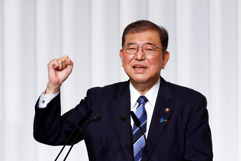 © Reuters. FILE PHOTO: Shigeru Ishiba, the newly elected leader of Japan's ruling party, the Liberal Democratic Party (LDP) reacts on the day of a press conference after the LDP leadership election, in Tokyo, Japan September 27, 2024. REUTERS/Kim Kyung-Hoon/Pool/File Photo