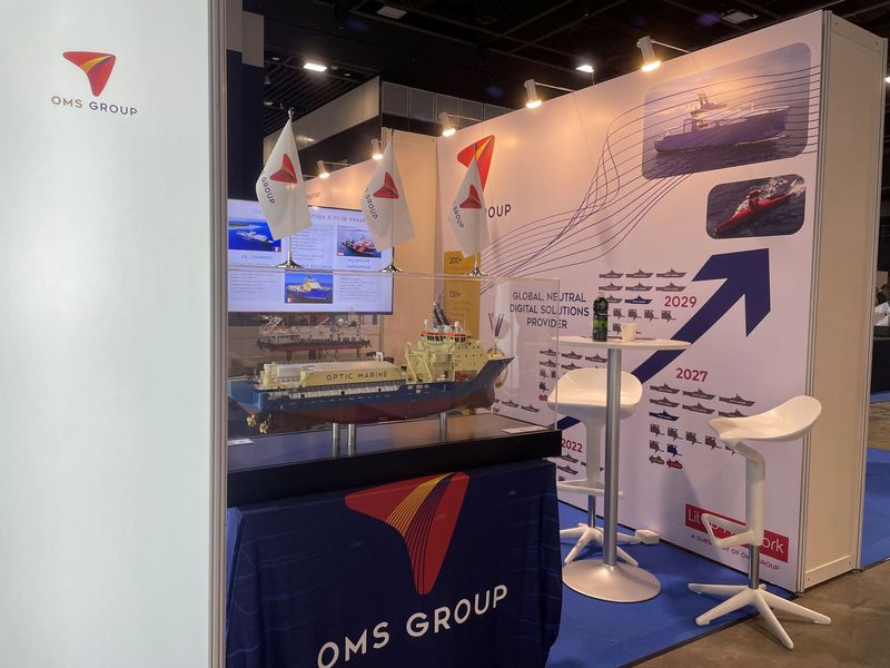 © Reuters. FILE PHOTO: A view of the booth of OMS Group at the Submarine Networks World 2024 industry conference at Suntec, in Singapore September 25, 2024. REUTERS/Yantoultra Ngui/File Photo