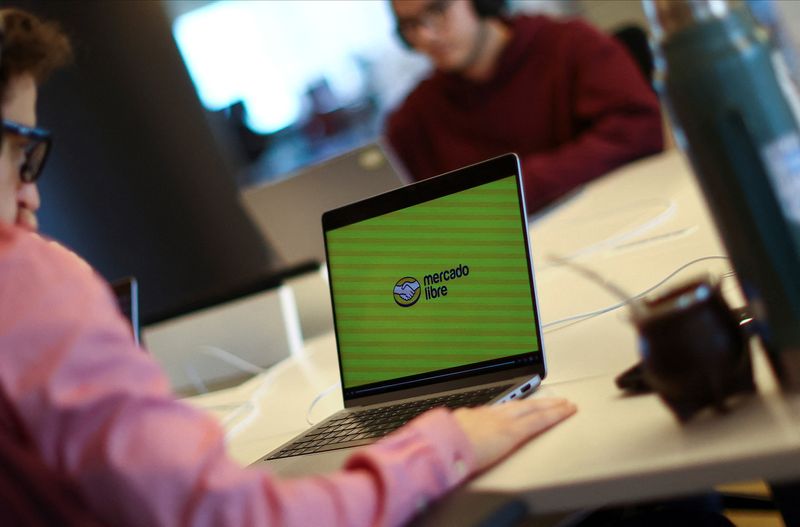 &copy; Reuters. An employee of e-commerce MercadoLibre works at the company's offices in Buenos Aires, Argentina September 6, 2024. REUTERS/Agustin Marcarian/File Photo