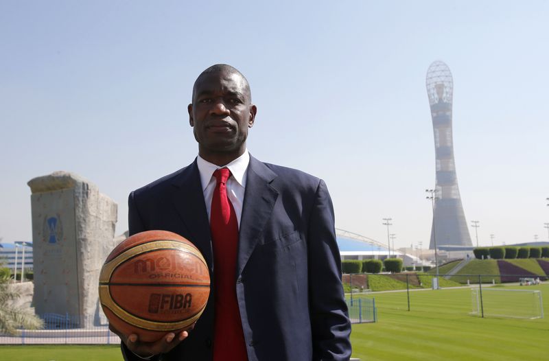 &copy; Reuters. FILE PHOTO: Former NBA star Dikembe Mutombo of U.S. poses before the start of a news conference at the Sports Congress and Exhibition at Aspire Dome in Doha November 12, 2012. REUTERS/Fadi Al-Assaad/File Photo