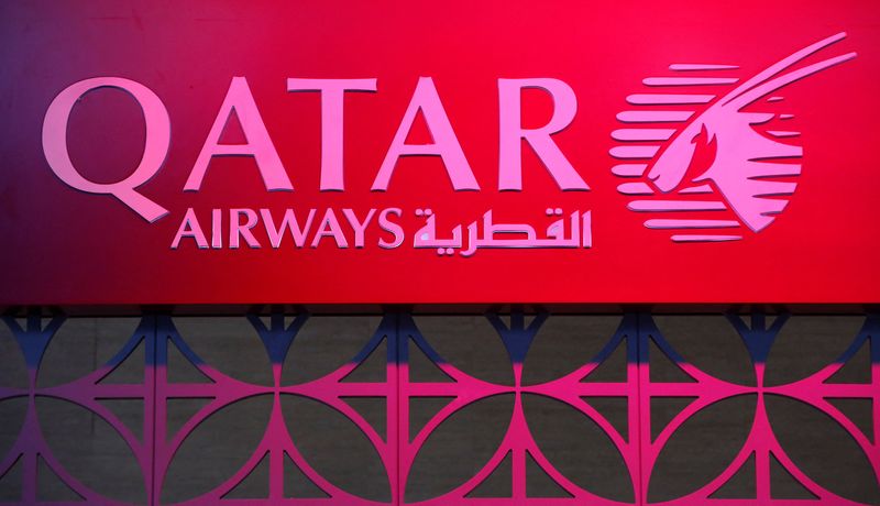 © Reuters. FILE PHOTO: The Qatar Airways logo is pictured at the International Travel Trade Fair (ITB) in Berlin, Germany March 9, 2016. REUTERS/Fabrizio Bensch/File Photo