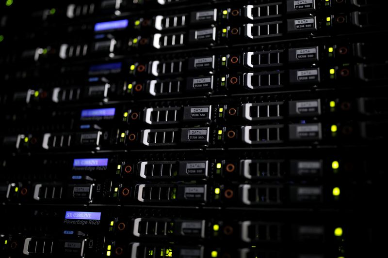 © Reuters. FILE PHOTO: Lights illuminate rack servers inside the data center of Equinix in Pantin, outside Paris, France, December 7, 2016. REUTERS/Benoit Tessier/File Photo