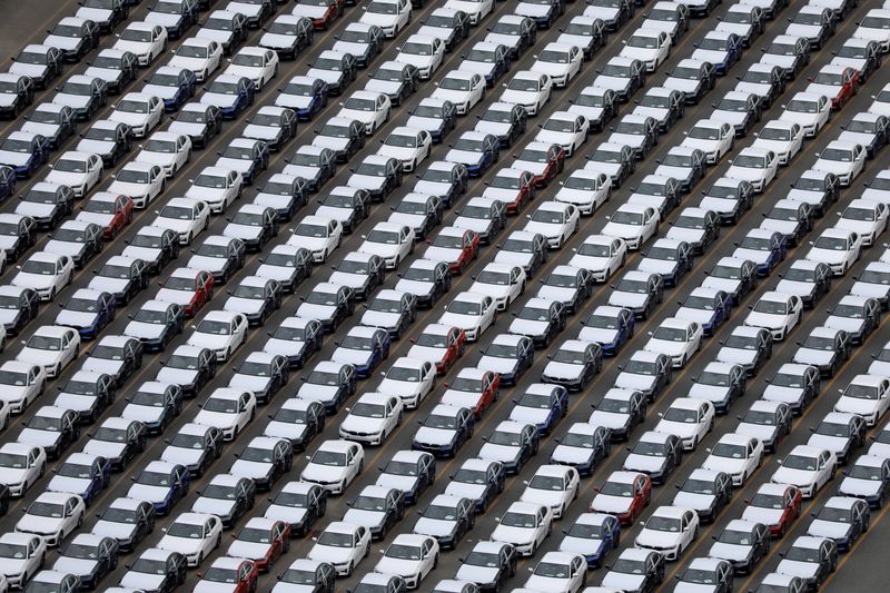 © Reuters. FILE PHOTO: Cars are seen parked at the port in Bayonne, New Jersey, U.S., August 21, 2021. REUTERS/Andrew Kelly/File Photo