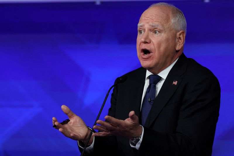 © Reuters. Democratic vice presidential nominee Minnesota Governor Tim Walz gestures as he speaks during a debate with Republican vice presidential nominee U.S. Senator JD Vance (R-OH) (not pictured) hosted by CBS in New York, U.S., October 1, 2024. REUTERS/Mike Segar