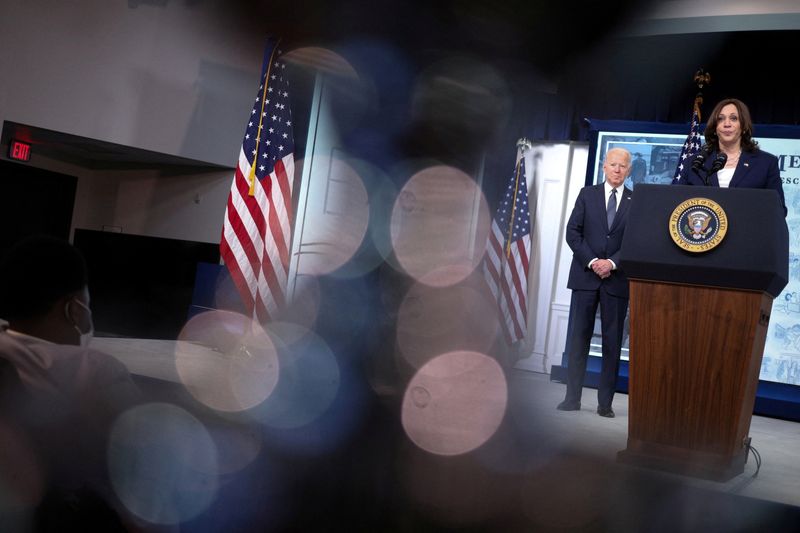 &copy; Reuters. FILE PHOTO: U.S. Vice President Kamala Harris speaks beside President Joe Biden about Child Tax Credit tax relief payments during a speech in the Eisenhower Executive Office Building's South Court Auditorium at the White House in Washington, U.S., July?15