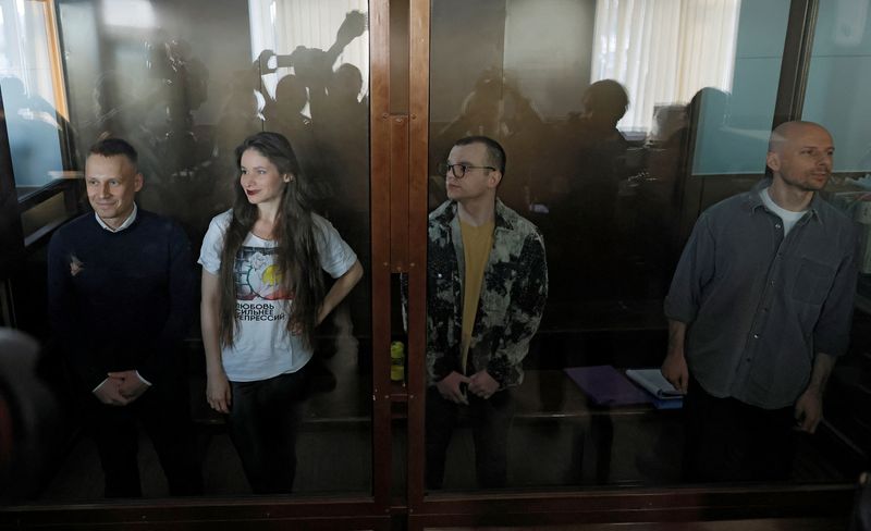 © Reuters. Journalists Konstantin Gabov, Antonina Favorskaya, Artem Kriger and Sergei Karelin, accused of taking part in the activities of an 