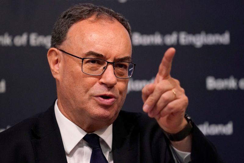 © Reuters. FILE PHOTO: Andrew Bailey, Governor of the Bank of England, gestures as he addresses the media during a press conference at the Bank of England in London, Britain, August 1, 2024. Alberto Pezzali/Pool via REUTERS/File Photo