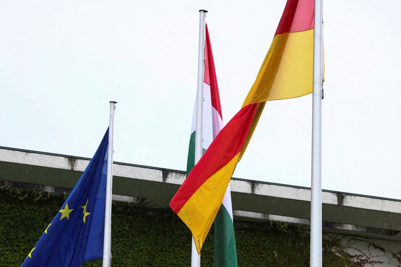 © Reuters. FILE PHOTO: The flags of the European Union, Hungary and Germany fly outside Berlin's chancellery in Berlin, Germany, June 21, 2024. REUTERS/Liesa Johannsson/File Photo