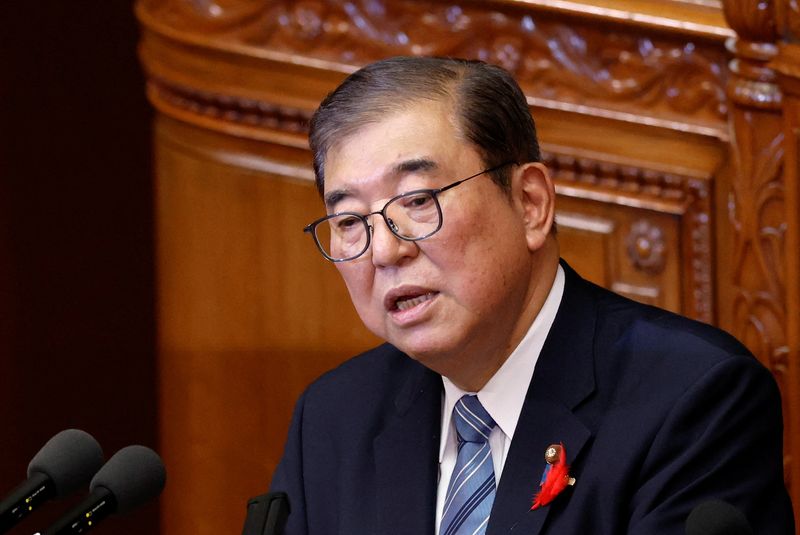 &copy; Reuters. FILE PHOTO: Japan's new Prime Minister Shigeru Ishiba gives his first policy speech at the lower house of the parliament in Tokyo, Japan, October 4, 2024. REUTERS/Kim Kyung-Hoon/File Photo