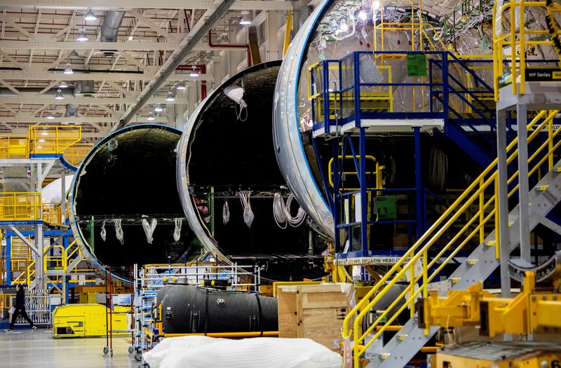 &copy; Reuters. An employee walks past a fuselage section under construction at Boeing Co.'s 787 Dreamliner campus, in North Charleston, South Carolina, U.S., May 30, 2023. Gavin McIntyre/Pool via REUTERS/File Photo