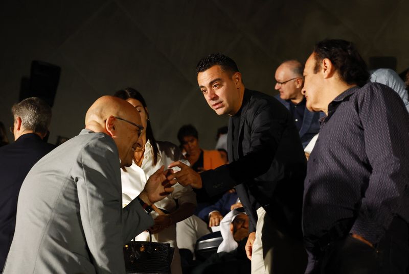 &copy; Reuters. FILE PHOTO: Soccer Football - Andres Iniesta Press Conference - The Game Continues - Barcelona, Spain - October 8, 2024 Former Barcelona coach Xavi during a press conference REUTERS/Albert Gea/File Photo