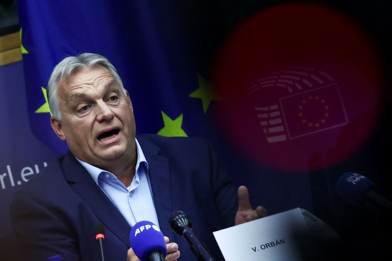 © Reuters. Hungarian Prime Minister Viktor Orban attends a press conference with MEP Kinga Gal, Vice-President of Patriots for Europe Group, at the European Parliament in Strasbourg, France October 8, 2024. REUTERS/Yves Herman