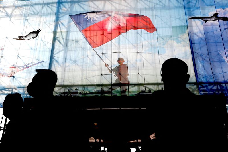 © Reuters. FILE PHOTO: Taiwanese flags are seen at the Ministry of National Defence of Taiwan in Taipei, Taiwan, December 26, 2022. REUTERS/Ann Wang/File Photo/File Photo