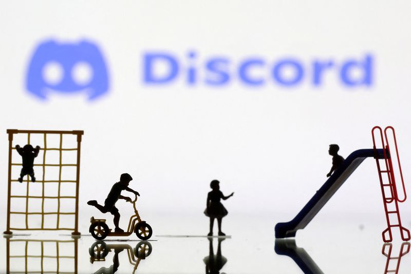 &copy; Reuters. Children playground miniatures are seen in front of displayed Discord logo in this illustration taken April 4, 2023. REUTERS/Dado Ruvic/Illustration/File Photo