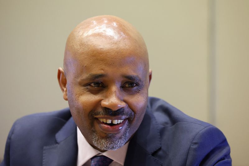 © Reuters. Eyob Tekalign, Ethiopia's State Finance Minister, reacts during an interview with Reuters in London, Britain, October 8, 2024. REUTERS/Toby Melville