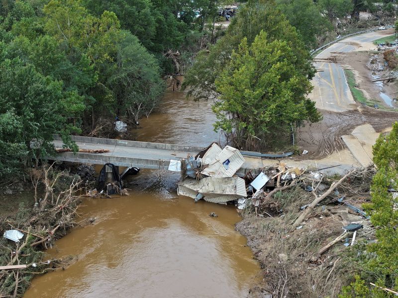 &copy; Reuters. FILE PHOTO: A drone view shows a damaged area, following the passing of Hurricane Helene, in Asheville, North Carolina, U.S., September 29, 2024. REUTERS/Marco Bello/File Photo