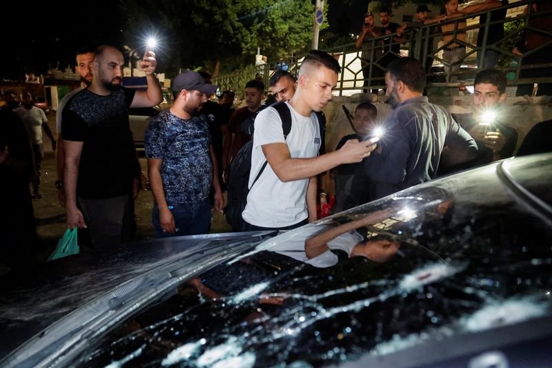 © Reuters. Bullet holes are seen on a vehicle, after Israeli police says forces killed Palestinian militants, in Nablus, West Bank. October 9, 2024. REUTERS/Raneen Sawafta