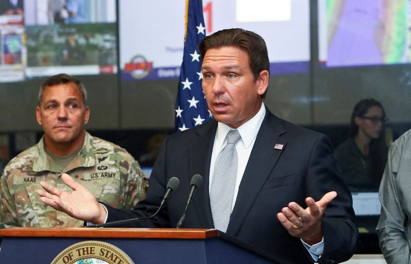 &copy; Reuters. FILE PHOTO: Florida Governor Ron DeSantis speaks about Hurricane Helene as Adjutant General of Florida Major General John Haas looks on during a press briefing at the Emergency Operations Center in Tallahassee, Florida, U.S., September 26, 2024.   REUTERS