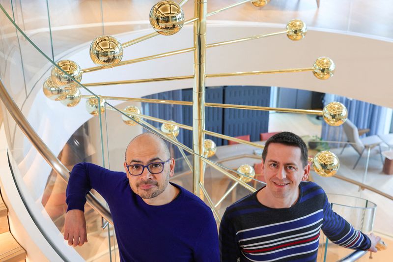 © Reuters. FILE PHOTO: Demis Hassabis and John M. Jumper, two of three laureates to receive the 2024 Nobel Prize in Chemistry, look on at the Google DeepMind UK offices in London, Britain October 9, 2024. REUTERS/ Toby Melville/File Photo