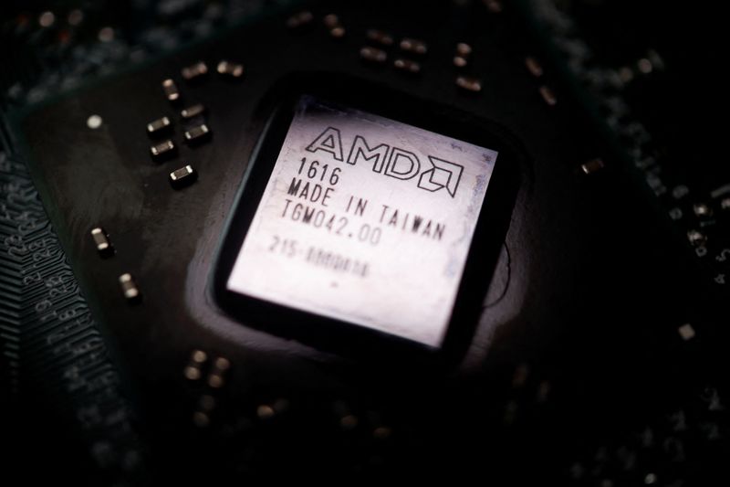 © Reuters. FILE PHOTO: The logo of semiconductor company Advanced Micro Devices Inc (AMD) is seen on a graphics processing unit (GPU) chip in this illustration picture taken February 17, 2023. REUTERS/Florence Lo/Illustration/File Photo