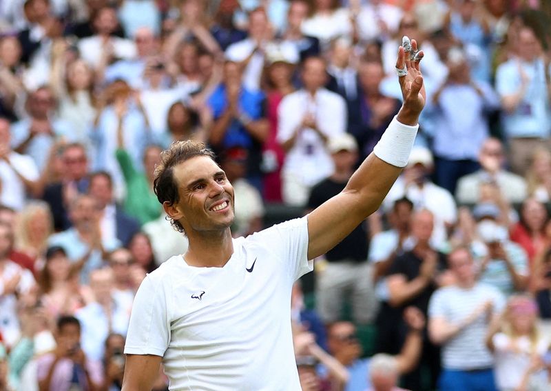 &copy; Reuters. Tennis - Wimbledon - All England Lawn Tennis and Croquet Club, Londra, Gran Bretagna - 6 luglio 2022 Lo spagnolo Rafael Nadal festeggia la vittoria nel suo quarto di finale contro lo statunitense Taylor Fritz REUTERS/Hannah Mckay