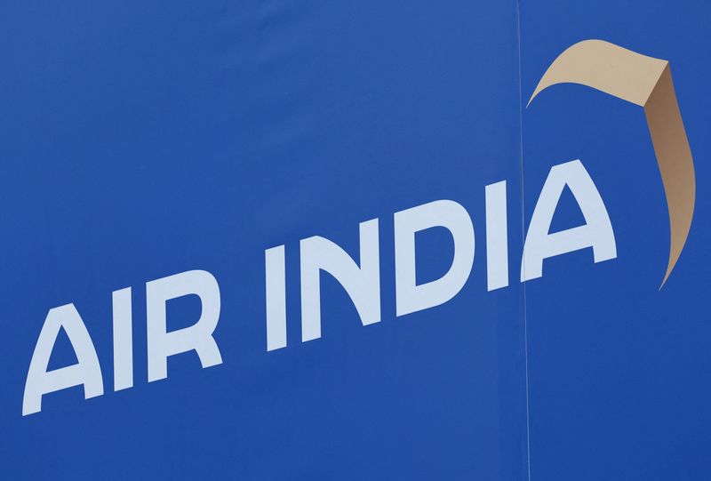 © Reuters. FILE PHOTO: Branding for Air India is seen on an exhibitor chalet at the Farnborough International Airshow, in Farnborough, Britain, July 24, 2024. REUTERS/Toby Melville/File Photo