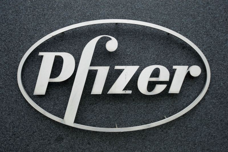 &copy; Reuters. FILE PHOTO: The Pfizer logo is seen at their UK commercial headquarters in Walton Oaks, Britain, February 1, 2021. REUTERS/Matthew Childs//File Photo