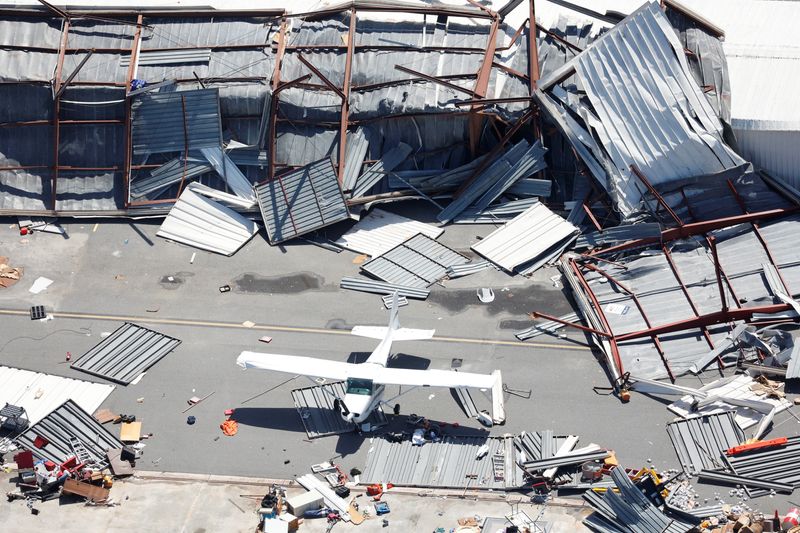 © Reuters. An aerial view shows the damaged Albert Whitted Airport, in the aftermath of Hurricane Milton, in St. Petersburg, Florida U.S., October 10, 2024. REUTERS/Marco Bello