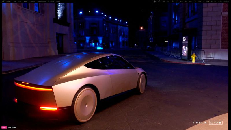 © Reuters. Tesla CEO and X owner Elon Musk rides in Tesla's robotaxi at an unveilling event in Los Angeles, California, U.S. October 10, 2024. Tesla/Handout via REUTERS   