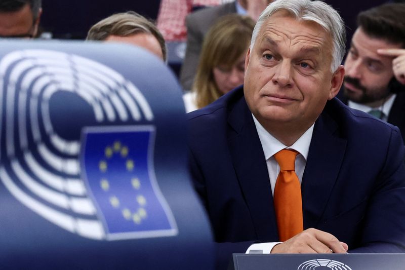 © Reuters. Hungarian Prime Minister Viktor Orban listens during a session at the European Parliament in Strasbourg, France October 9, 2024. REUTERS/Yves Herman