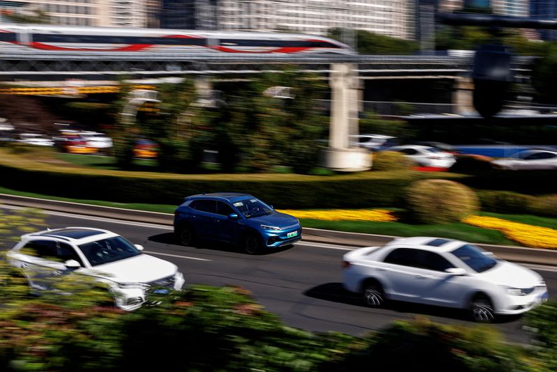 &copy; Reuters. FILE PHOTO: A BYD's electric vehicle (EV) Yuan Plus moves on a street in Beijing, China October 20, 2023. REUTERS/Tingshu Wang/File Photo