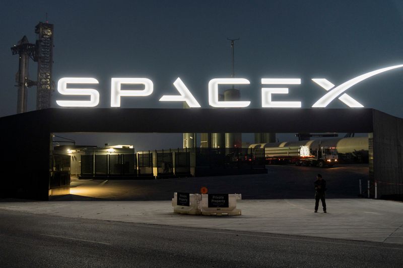 &copy; Reuters. A security guard monitors the entrance as SpaceX's next-generation Starship spacecraft atop its powerful Super Heavy rocket is prepared for a third launch from the company's Boca Chica launchpad on an uncrewed test flight, near Brownsville, Texas, U.S. Ma