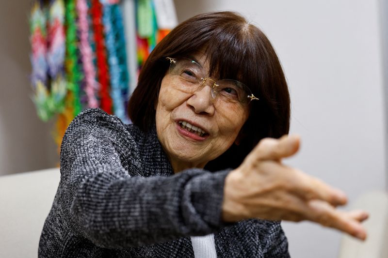 &copy; Reuters. Teruko Yahata, who survived the 1945 atomic bombing of Hiroshima, gestures, as she speaks at an interview with Reuters on the following day of The Japan Confederation of A- and H-Bomb Sufferers Organizations (Nihon Hidankyo) winning the 2024 Nobel Peace P