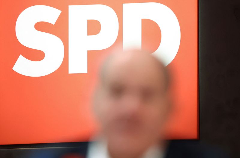 &copy; Reuters. FILE PHOTO: German Chancellor Olaf Scholz is pictured in front of the logo of Germany’s Social Democratic SPD party during a three-day SPD convention in Berlin, Germany, December 8, 2023. REUTERS/Liesa Johannssen/File Photo