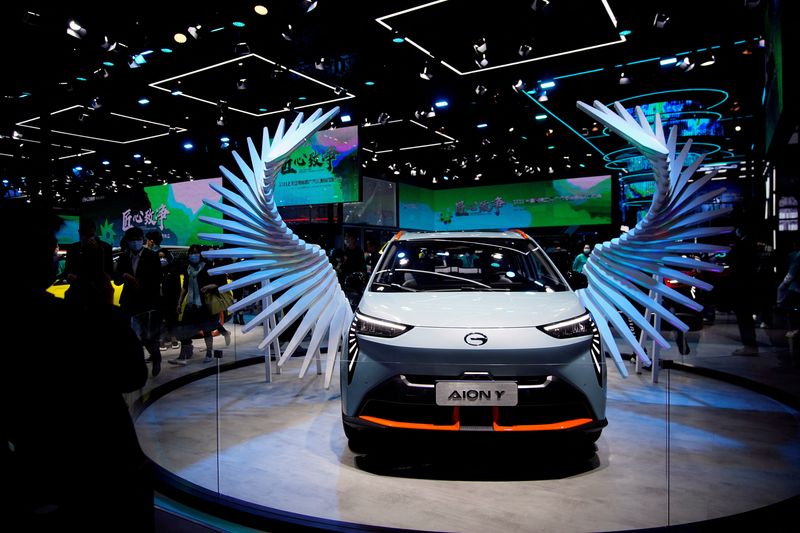 &copy; Reuters. FILE PHOTO: A GAC Aion Y electric vehicle (EV) is seen displayed at the booth of GAC Group during a media day for the Auto Shanghai show in Shanghai, China April 19, 2021. REUTERS/Aly Song/File Photo