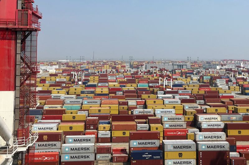 &copy; Reuters. FILE PHOTO: Containers sit at a terminal at the Yangshan deepwater port during an organised media tour, in Shanghai, China October 10, 2024. REUTERS/Casey Hall/File Photo