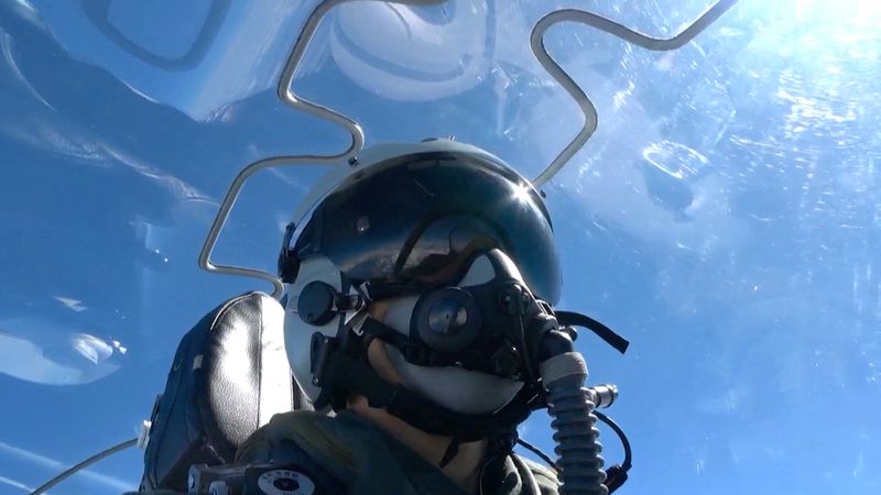 &copy; Reuters. A member of Chinese People's Liberation Army (PLA) sits in an aircraft during the "Joint Sword-2024B" military drills around Taiwan, from an undisclosed location in this screenshot from a handout video released by the PLA Eastern Theatre Command on Octobe