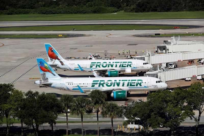 © Reuters. FILE PHOTO: Frontier airlines planes are parked at the boarding gates at Tampa International Airport in Tampa, Florida, U.S., July 19, 2024. REUTERS/Octavio Jones/File Photo