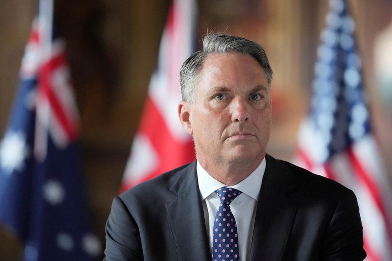 &copy; Reuters. FILE PHOTO: Australian Defense Minister Richard Marles listens during the AUKUS Defence Ministers Meeting at Old Royal Naval College, Greenwich, London, Thursday, Sept. 26, 2024.    Kin Cheung/Pool via REUTERS/File Photo